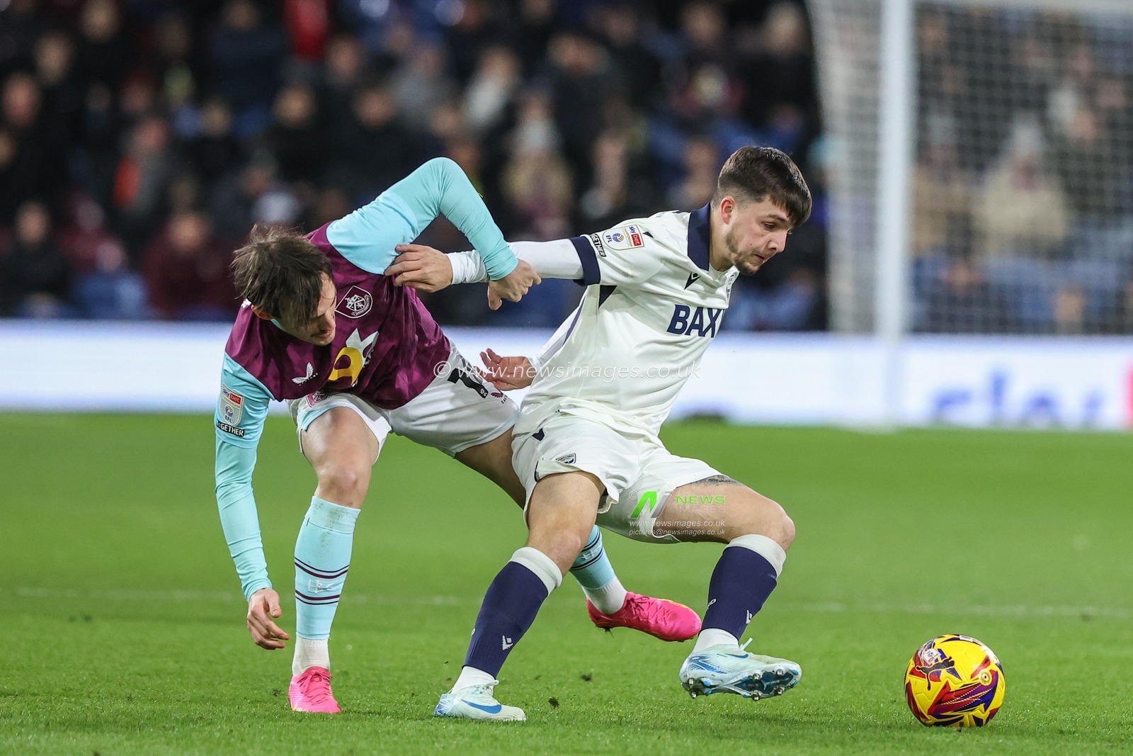 Tyler Goodrham of Oxford United holds off Connor Roberts of Burnley during the Sky Bet Championship match Burnley vs Oxford United at Turf Moor, Burnley, United Kingdom, 4th February 2025

(Photo by Alfie Cosgrove/News Images)