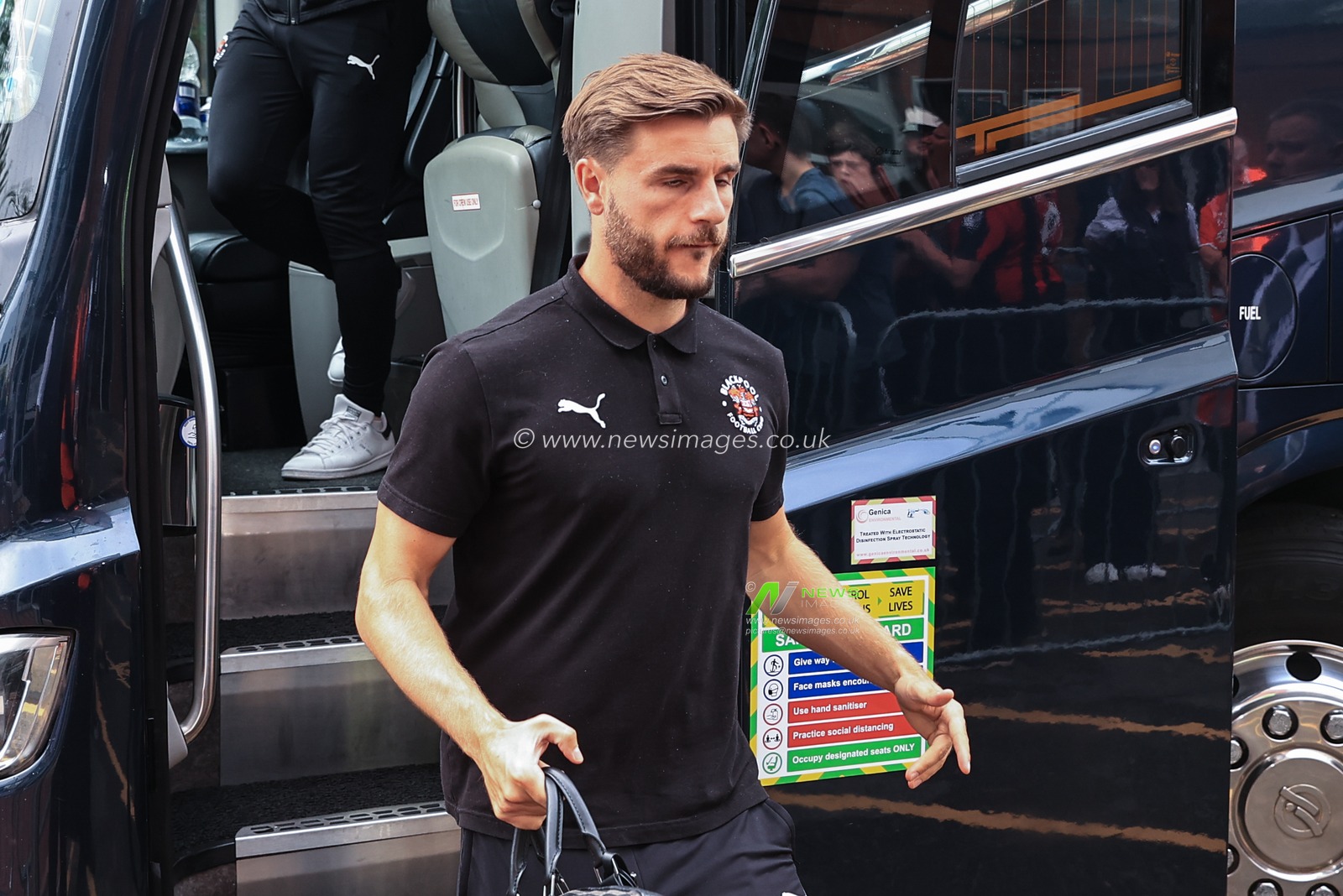 Luke Garbutt #29 of Blackpool arrives at the Vitality Stadium