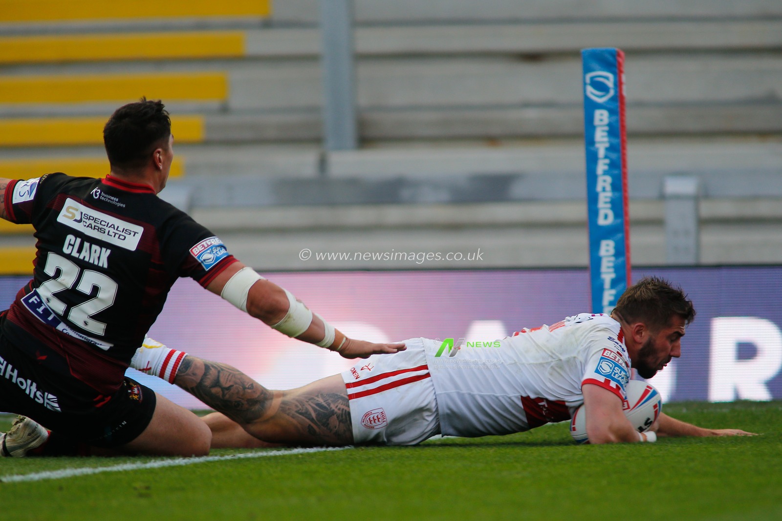Greg Minikin (5) of Hull KR scores his 3rd try of the game against Wigan Warriors.
