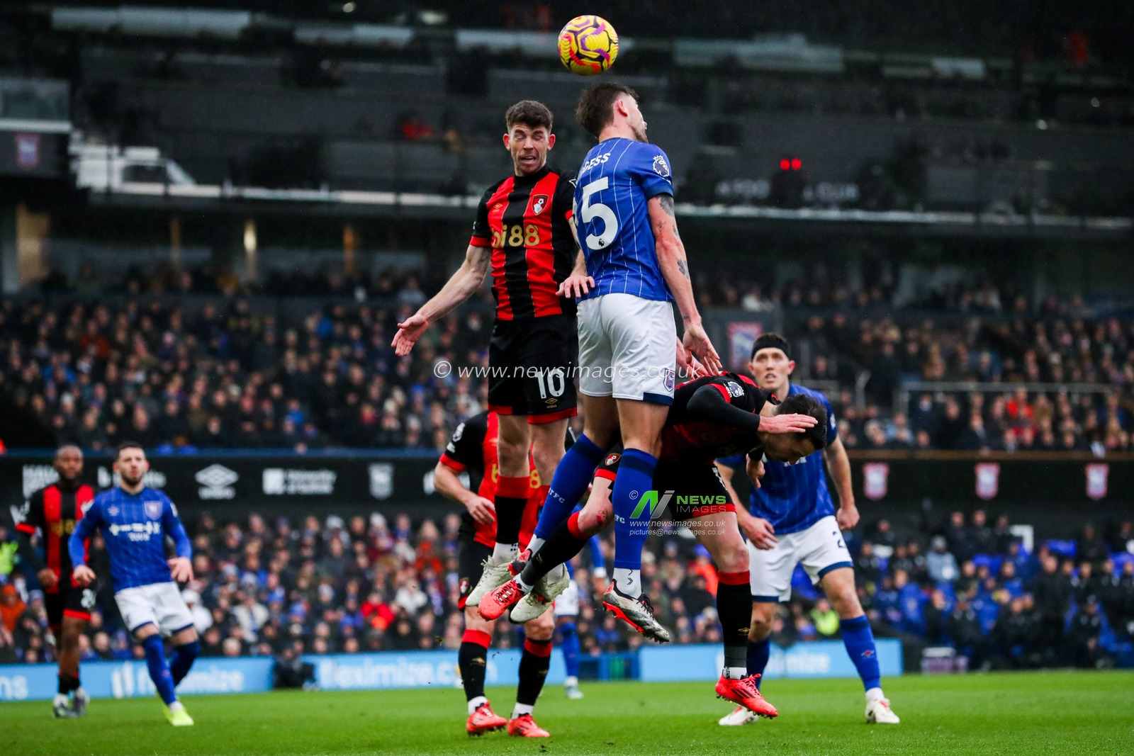 Ryan Christie of AFC Bournemouth jumps for the ball with Cameron Burgess of Ipswich Town during the Premier League match Ipswich Town vs Bournemouth at Portman Road, Ipswich, United Kingdom, 8th December 2024

(Photo by Izzy Poles/News Images)