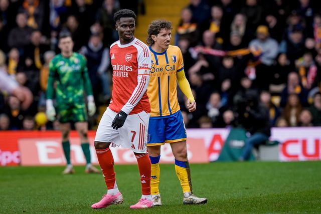 Bukayo Saka of Arsenal and Aaron Lewis of Mansfield Town during the Emirates FA Cup fifth round match Mansfield Town vs Arsenal at One Call Stadium, Mansfield, United Kingdom on 07 March 2026

(Photo by Maynard Manyowa/News Images)