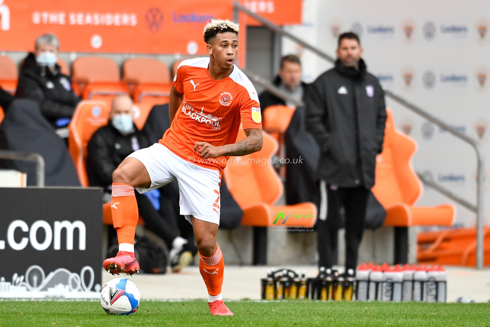 Jordan Lawrence-Gabriel (2) of Blackpool looks for a pass
