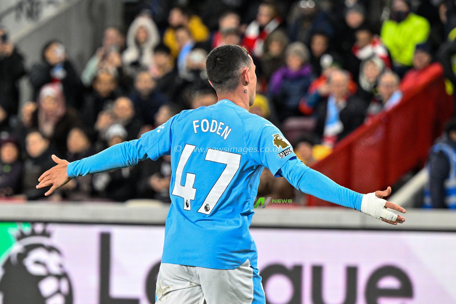 Phil Foden of Manchester City celebrates his goal to make it 1-3 during the Premier League match Brentford vs Manchester City at The Gtech Community Stadium, London, United Kingdom, 5th February 2024

(Photo by Cody Froggatt/News Images)