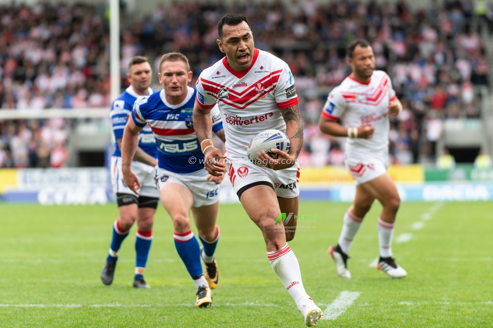 1st June 2019 , Totally Wicked Stadium, St Helens, England; Coral Challenge Cup 2019, Quarter Final , St Helens vs Wakefield Trinity ; Zeb Taia of St Helens scores a try


Credit: Richard Long/News Images
