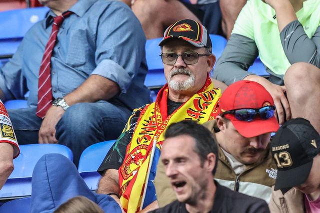 Catalans Dragons fans in attendance during the Betfred Super League round 20 match Wigan Warriors vs Catalans Dragons at The Brick Community Stadium, Wigan, United Kingdom, 25th July 2025

(Photo by Alfie Cosgrove/News Images)
