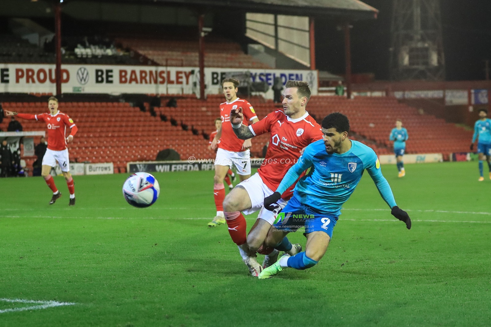 Michael Sollbauer #26 of Barnsley blocks Dominic Solanke #9 of Bournemouth shot on goal