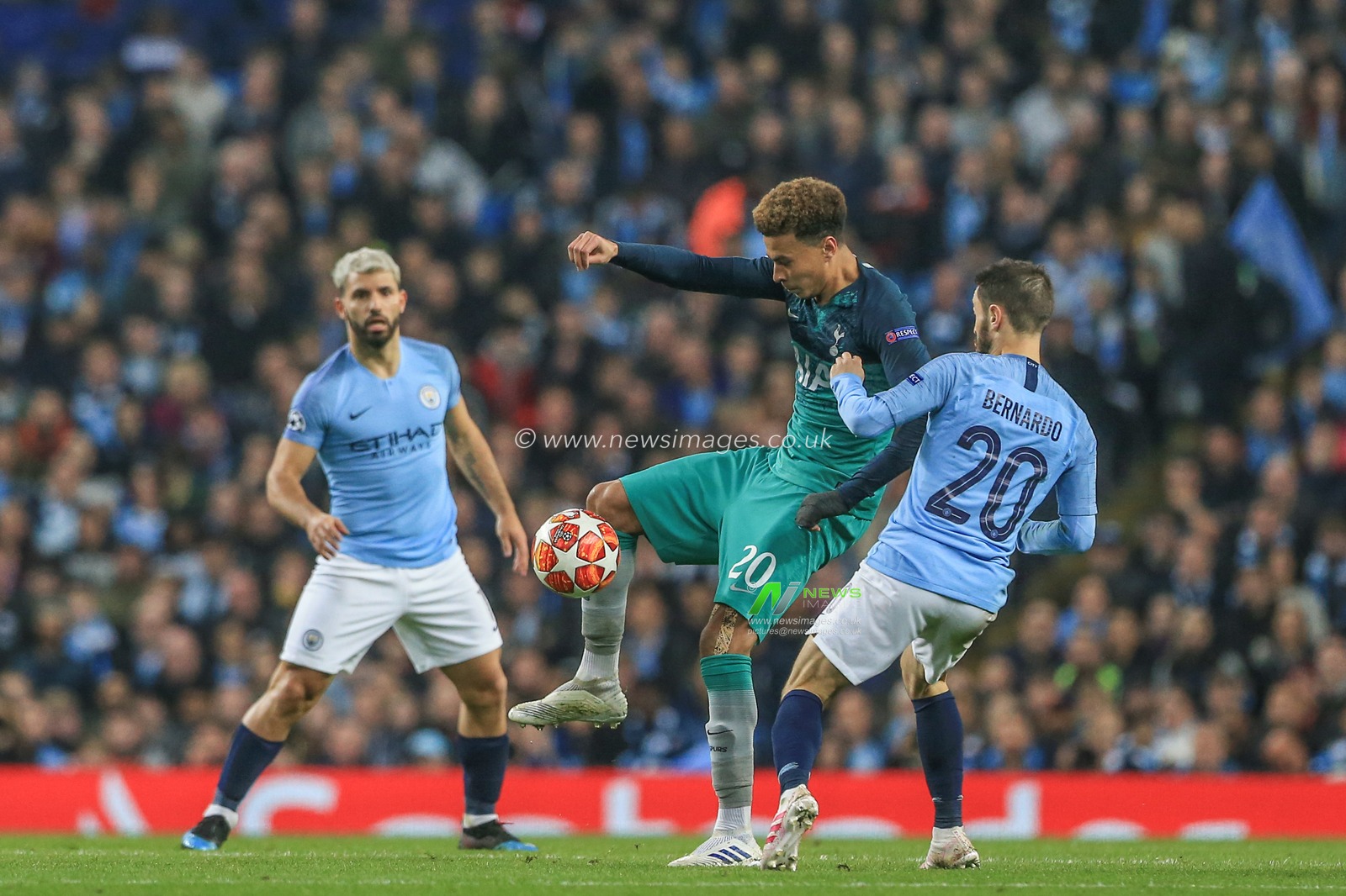 17th April 2019 , Etihad Stadium, Manchester, England; UEFA Champions League, Quarter Final, Second Leg, Manchester City v Tottenham ; Dele Alli (20) of Tottenham controls the ball while under pressure from Bernardo Silva (20) of Manchester City 


Credit: Mark Cosgrove/News Images