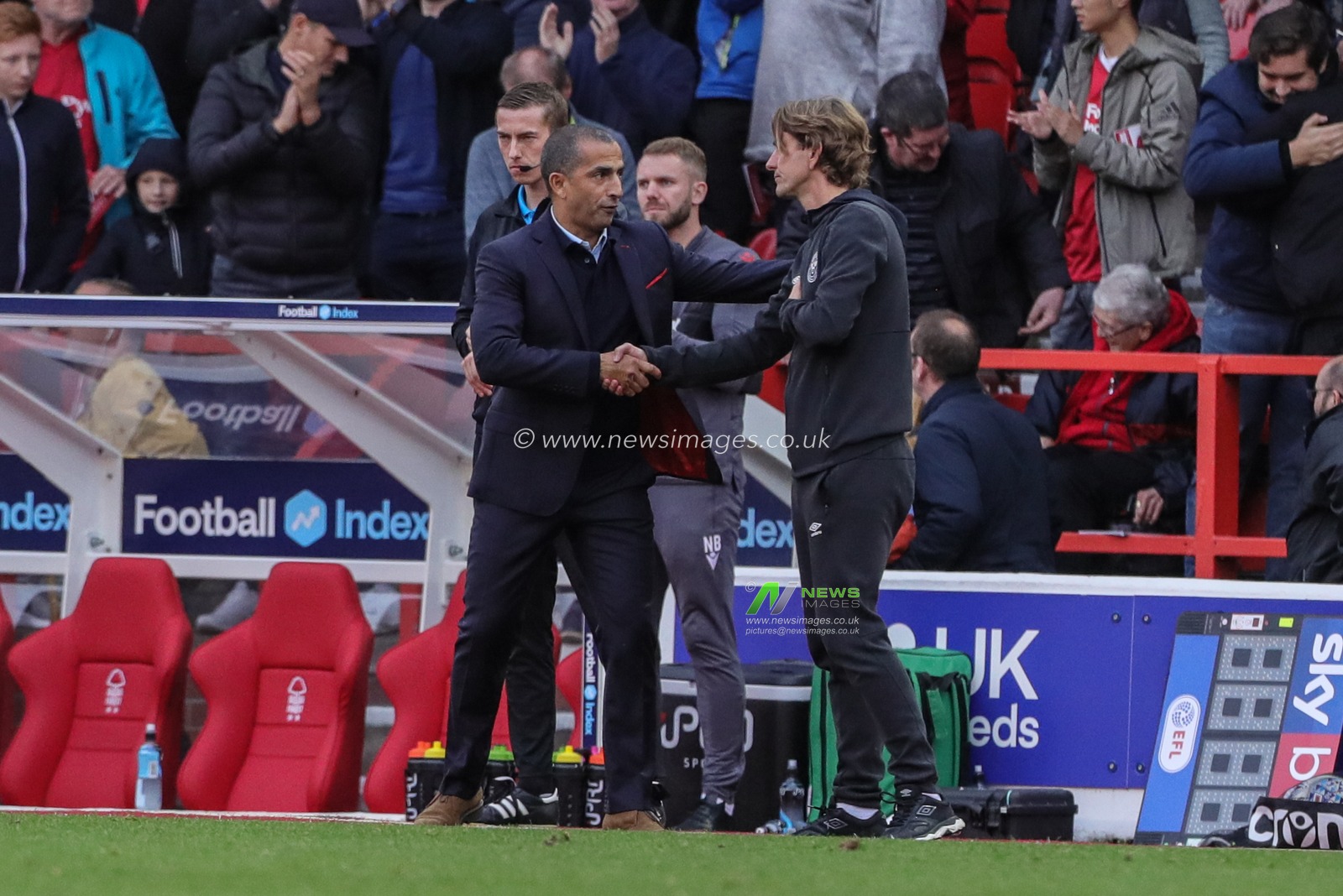 5th October 2019, City Ground, Nottingham, England; Sky Bet Championship, Nottingham Forest v Brentford : Sabri Lamouchi manager of Nottingham Forest shakes the hand of Thomas Frank manager of Brentford as Forest roll out 1-0 winners 

Credit: Mark Cosgrove/News Images