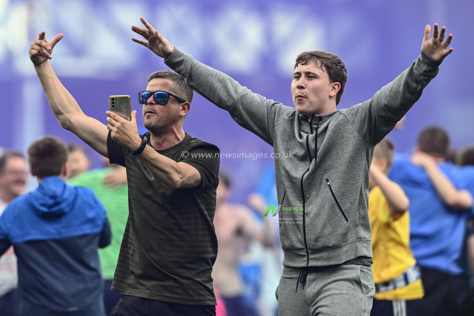 Everton fans celebrate at the final whistle avoiding relegation in the Premier League match Everton vs Bournemouth at Goodison Park, Liverpool, United Kingdom, 28th May 2023

(Photo by Craig Thomas/News Images)