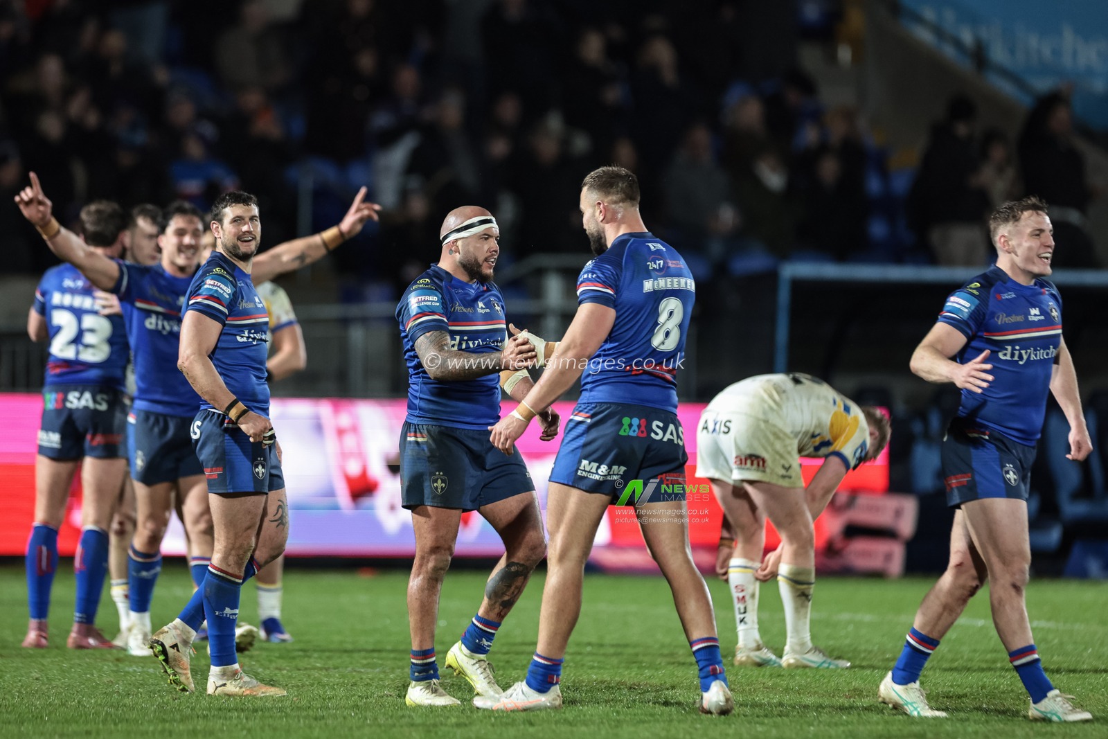 Jazz Tevaga of Wakefield Trinity and Mike McMeeken of Wakefield Trinity celebrate the win during the Betfred Challenge Cup round 4 match Wakefield Trinity vs Leeds Rhinos at DIY Kitchens Stadium, Wakefield, United Kingdom on 13 March 2026

(Photo by Mark Cosgrove/News Images)