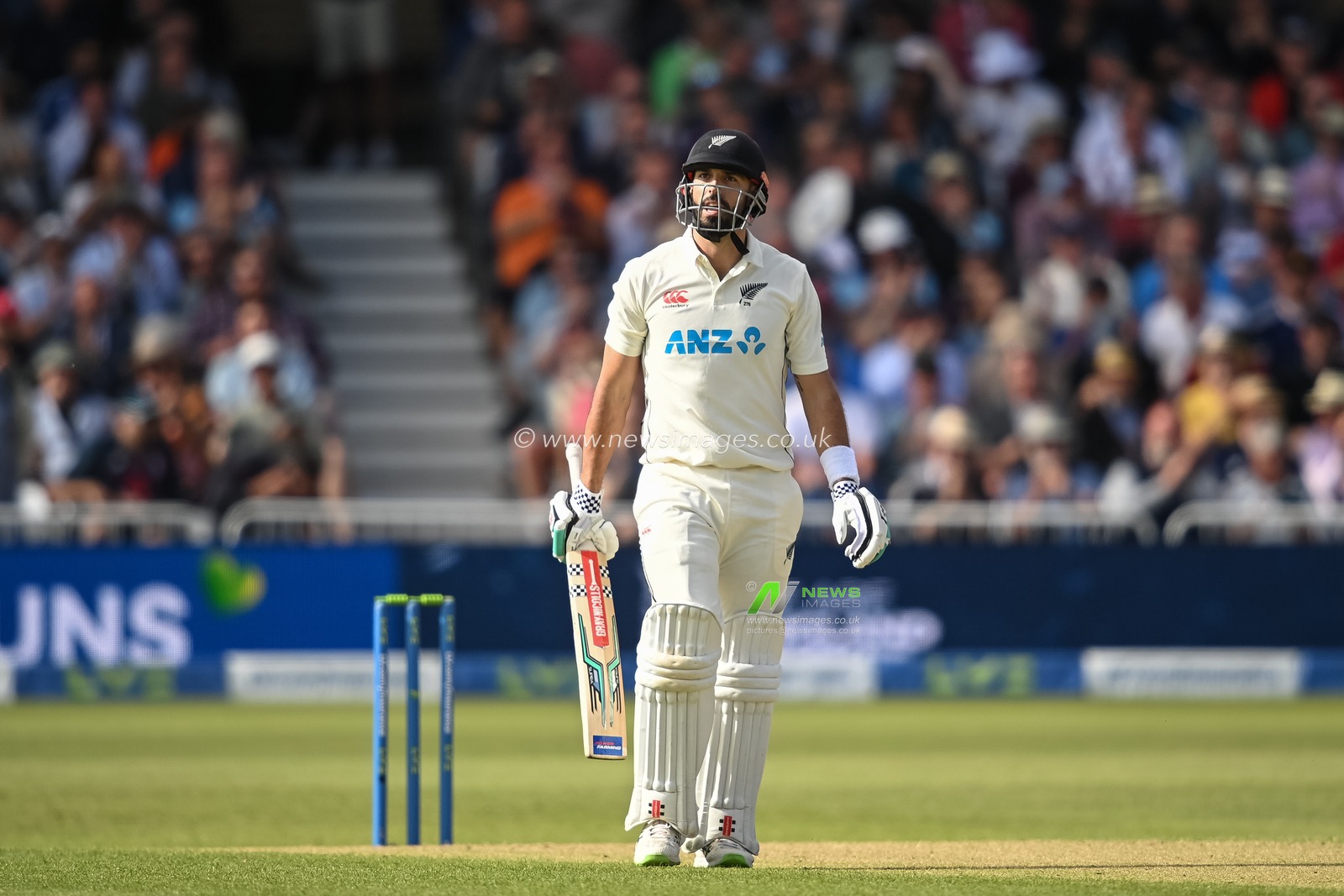 Daryl Mitchell of New Zealand leaves the field on 190 runs after being caught by Ben Foakes of England during day 2 of the 2nd Test between the New Zealand Blackcaps and England at Trent Bridge Cricket Ground, Nottingham, England on Saturday 11 June 2022.
New Zealand tour of England 2022.
 Â© Craig Thomas / www.photosport.nz