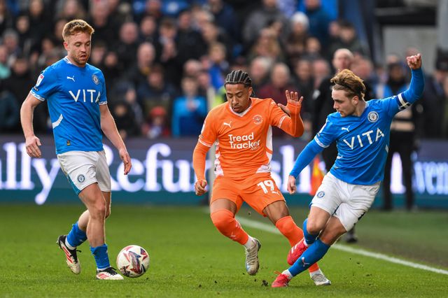 Sammy Slivera of Blackpool and Lewis Bate of Stockport County battle for the ball during the Sky Bet League 1 match Stockport County vs Blackpool at Edgeley Park Stadium, Stockport, United Kingdom, 1st March 2025

(Photo by Craig Thomas/News Images)