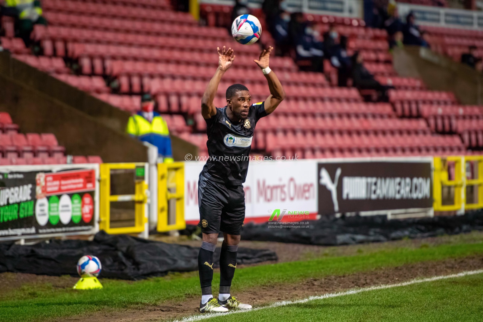 Tendayi Darikwa #2 of Wigan Athletic takes the throw in