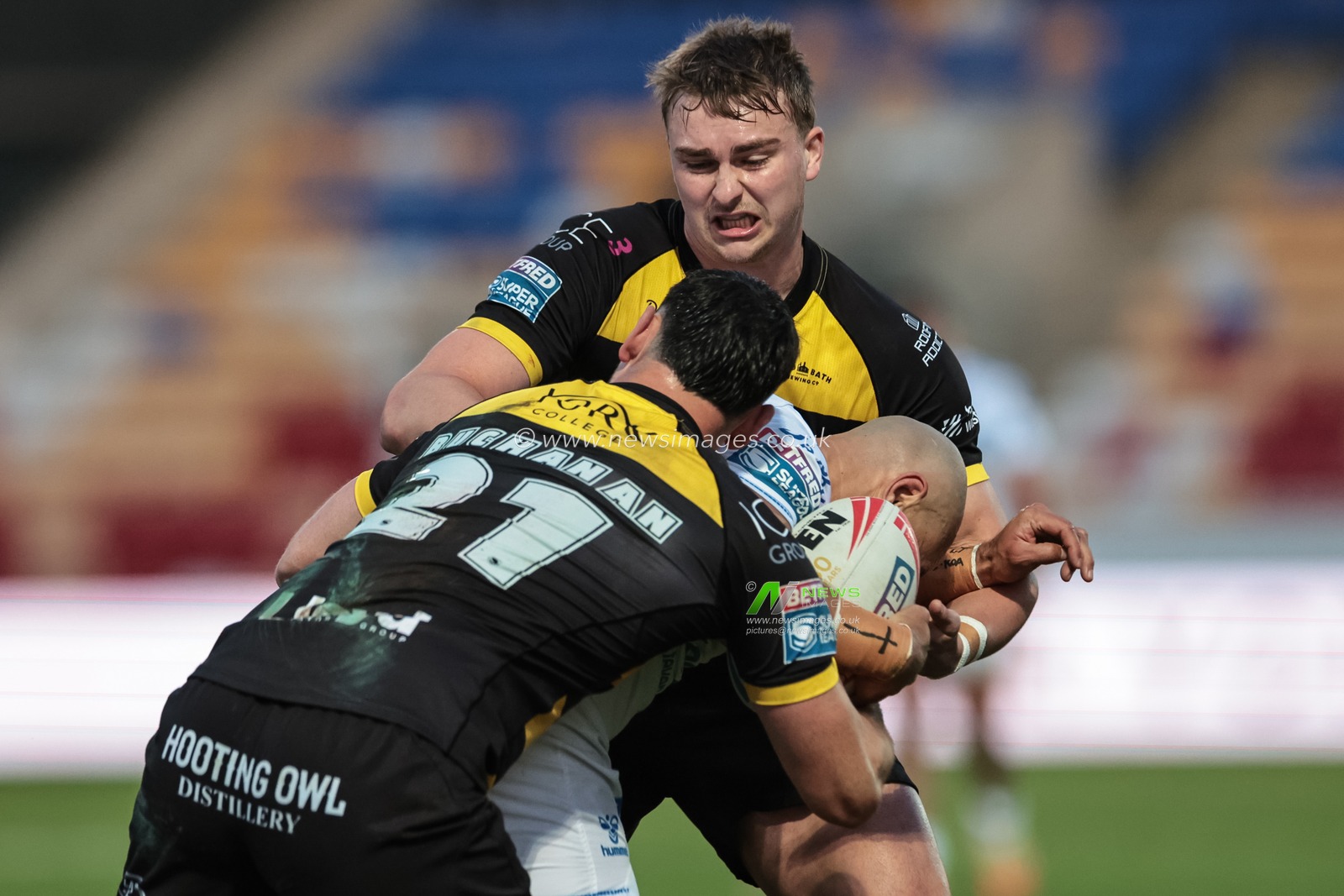 Paul Ulberg of Toulouse Olympique is tackled by Oli Field of York Knights and Kieran Buchanan of York Knights during the Betfred Super League round 9 match York Knights vs Toulouse at LNER Community Stadium, York, United Kingdom on 23 April 2026

(Photo by Mark Cosgrove/News Images)