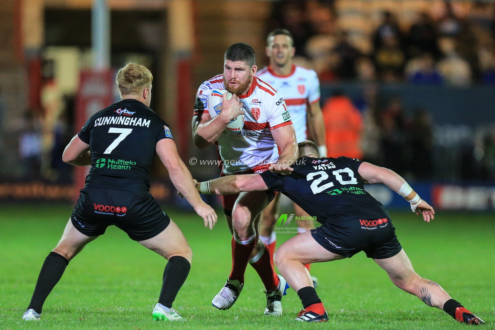 6th September 2019 , KCOM Craven Park, Hull, England;  Betfred Super League Rugby, Round 28, Hull KR vs London Broncos ; Mitch Garbutt (14) of Hull KR runs at Luke Yates (20) of London Broncos 

Credit: David Greaves/News Images