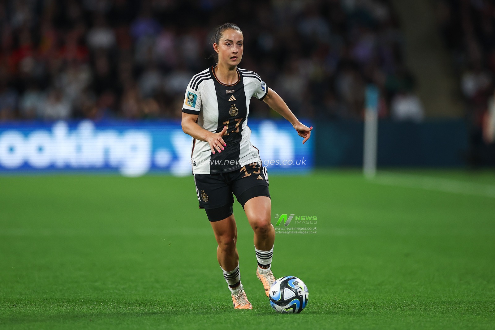 Sara DÃ¤britz #13 of Germany makes a break with the ball during the FIFA Women's World Cup 2023 Group H South Korea Women vs Germany Women at Adelaide Oval, Adelaide, Australia, 3rd August 2023

(Photo by Patrick Hoelscher/News Images)