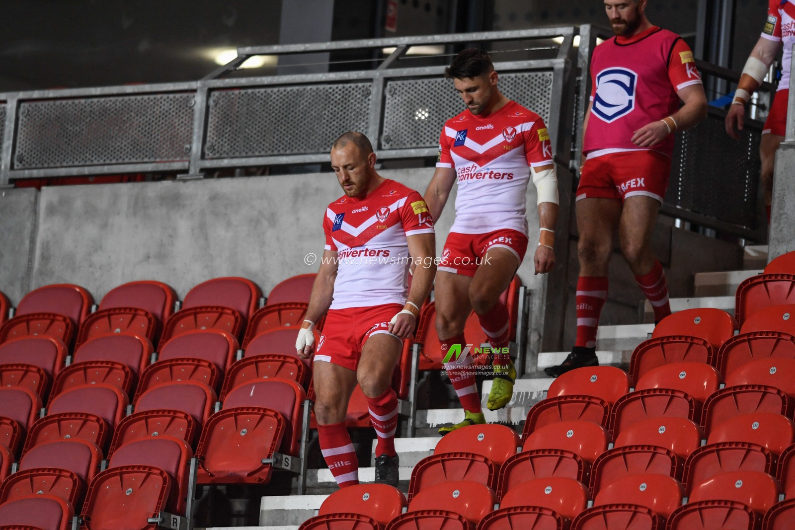 James Roby (9) of St Helens leads his team out onto the pitch