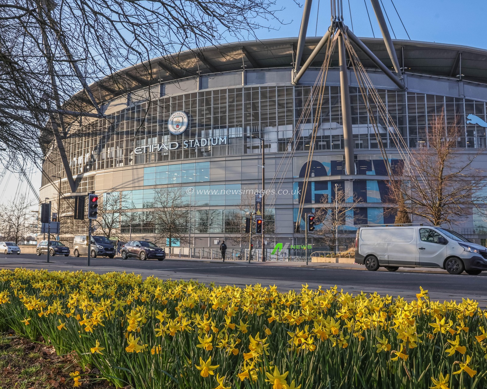 A general view of the Etihad Stadium through a bed of daffodils during the Premier League match Manchester City vs Nottingham Forest at Etihad Stadium, Manchester, United Kingdom on 04 March 2026

(Photo by Mark Cosgrove/News Images)
