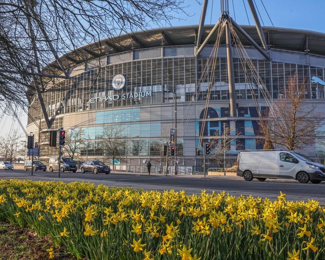 A general view of the Etihad Stadium through a bed of daffodils during the Premier League match Manchester City vs Nottingham Forest at Etihad Stadium, Manchester, United Kingdom on 04 March 2026

(Photo by Mark Cosgrove/News Images)