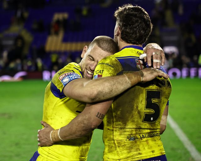 Matt Dufty of Warrington Wolves embraces Matty Ashton of Warrington Wolves as they celebrate their win during the Betfred Super League Round 2 match Warrington Wolves vs Catalans Dragons at Luke Littler Stadium, Warrington, United Kingdom, 21st February 2025

(Photo by Mark Cosgrove/News Images)