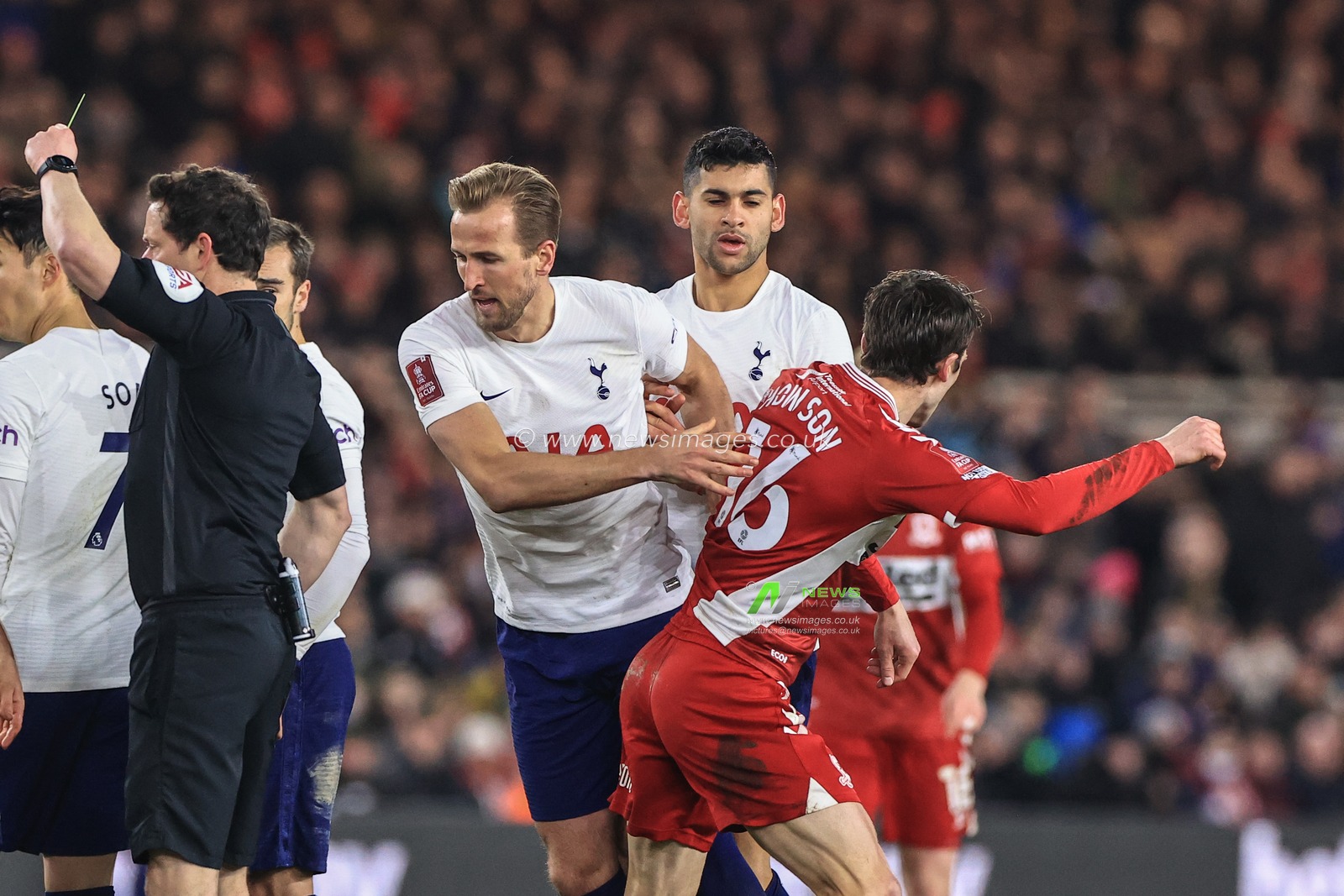 Harry Kane #10 of Tottenham Hotspur and Jonathan Howson #16 of Middlesbrough tussle