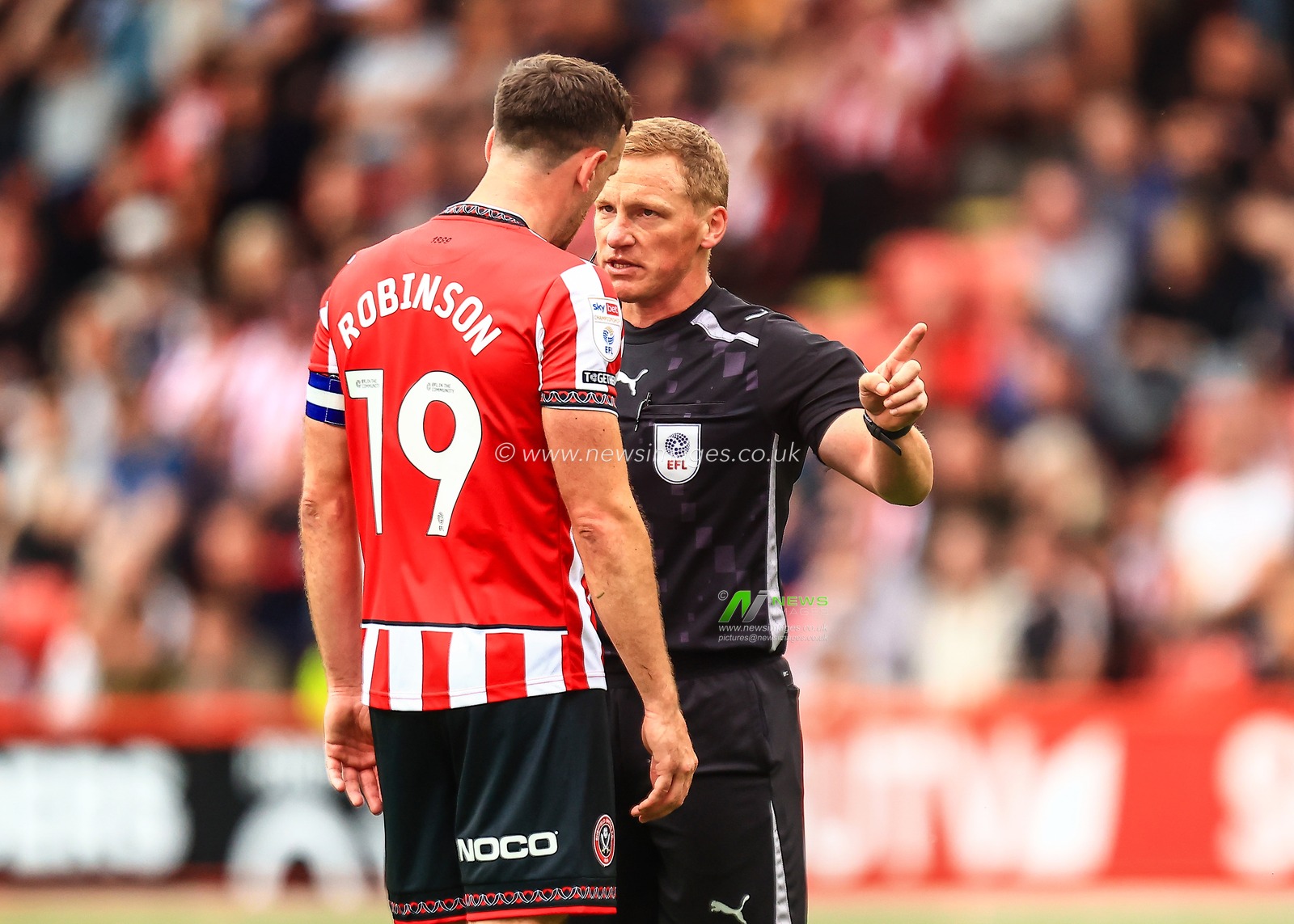 referee John Busby talks to Jack Robinson of Sheffield United during the Sky Bet Championship match Sheffield United vs Millwall at Bramall Lane, Sheffield, United Kingdom, 23rd August 2025

(Photo by Richard Bierton/News Images)