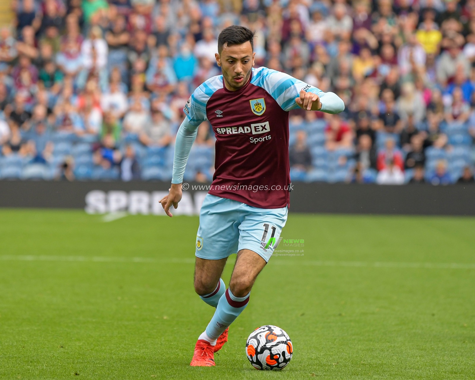 Dwight McNeil #11 of Burnley with the ball