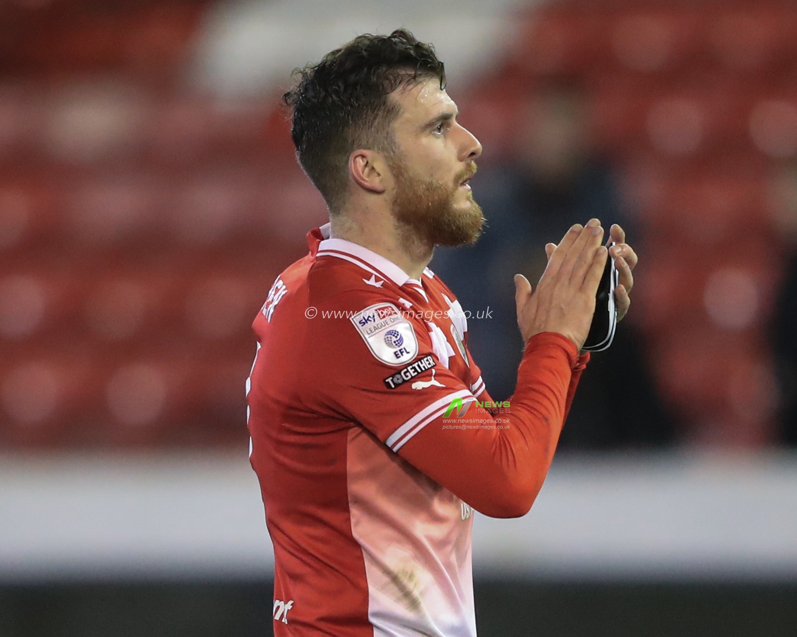 Nicky Cadden of Barnsley applauds the home fans after a 1-1 draw during the Sky Bet League 1 match Barnsley vs Wigan Athletic at Oakwell, Barnsley, United Kingdom, 1st January 2024

(Photo by Alfie Cosgrove/News Images)