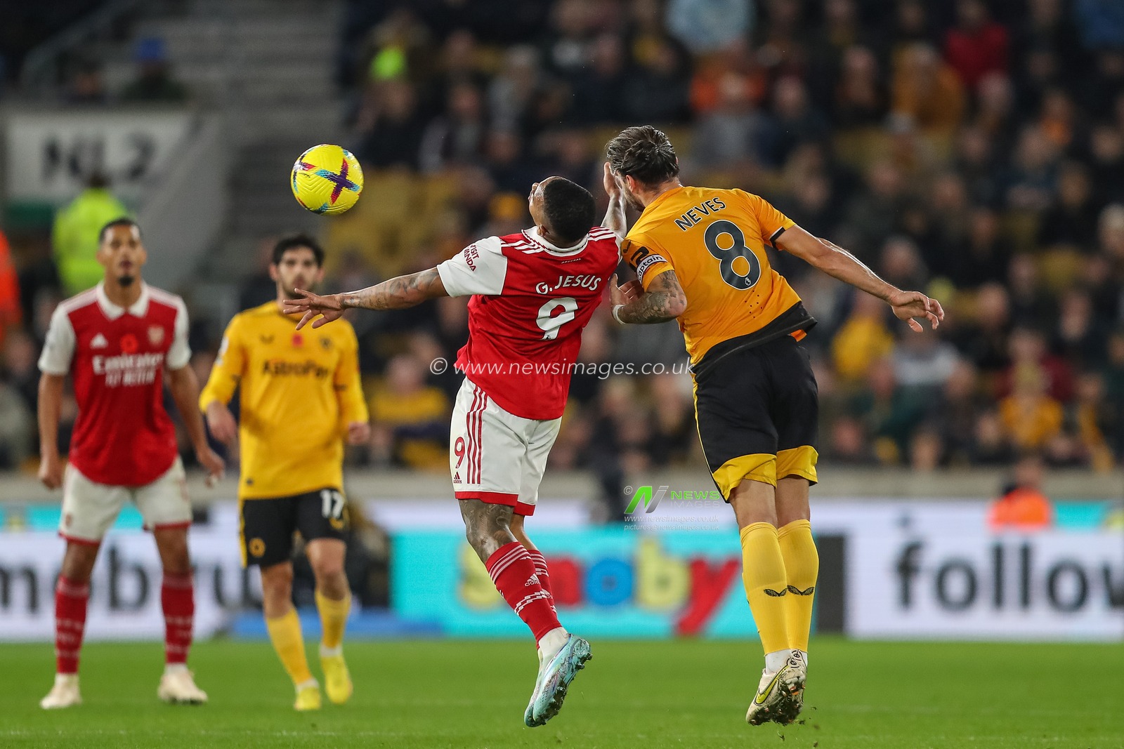 Gabriel Jesus #9 of Arsenal and RubÃ©n Neves #8 of Wolverhampton Wanderers battle for the ball during the Premier League match Wolverhampton Wanderers vs Arsenal at Molineux, Wolverhampton, United Kingdom, 12th November 2022

(Photo by Gareth Evans/News Images)