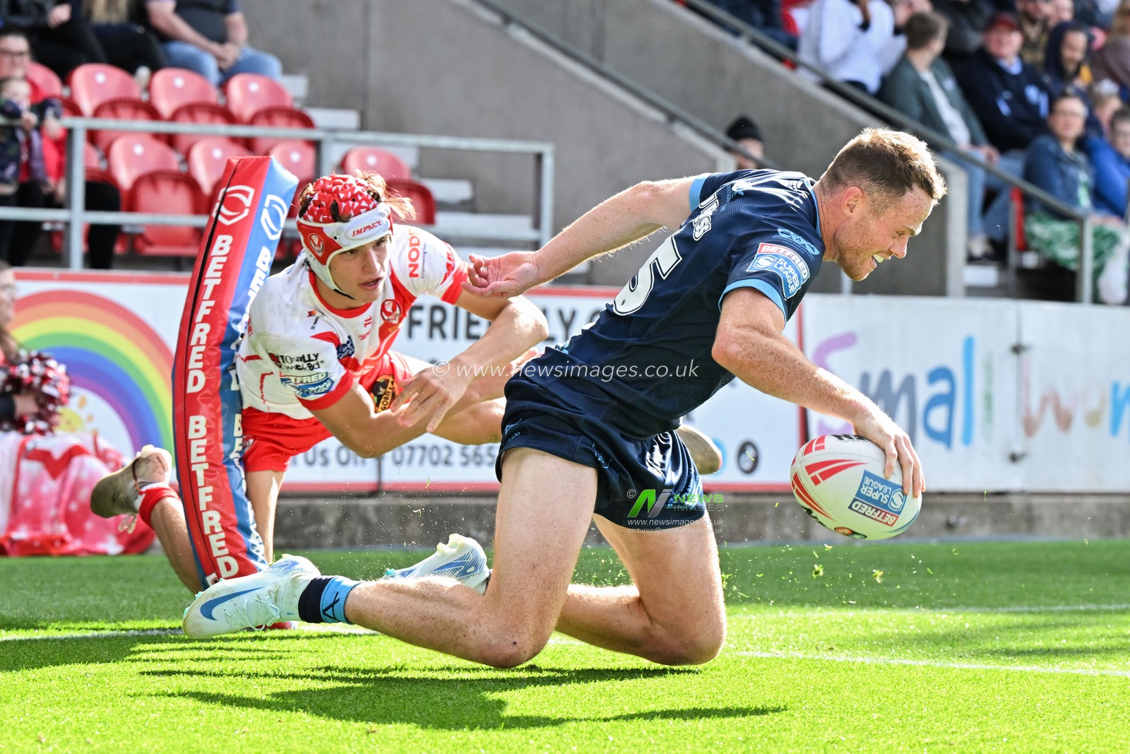 Joe Burgess of Hull KR goes over for his fourth try to make it 6-36 Hull during the Betfred Super League Round 23 match St Helens vs Hull KR at Totally Wicked Stadium, St Helens, United Kingdom, 24th August 2024

(Photo by Cody Froggatt/News Images)