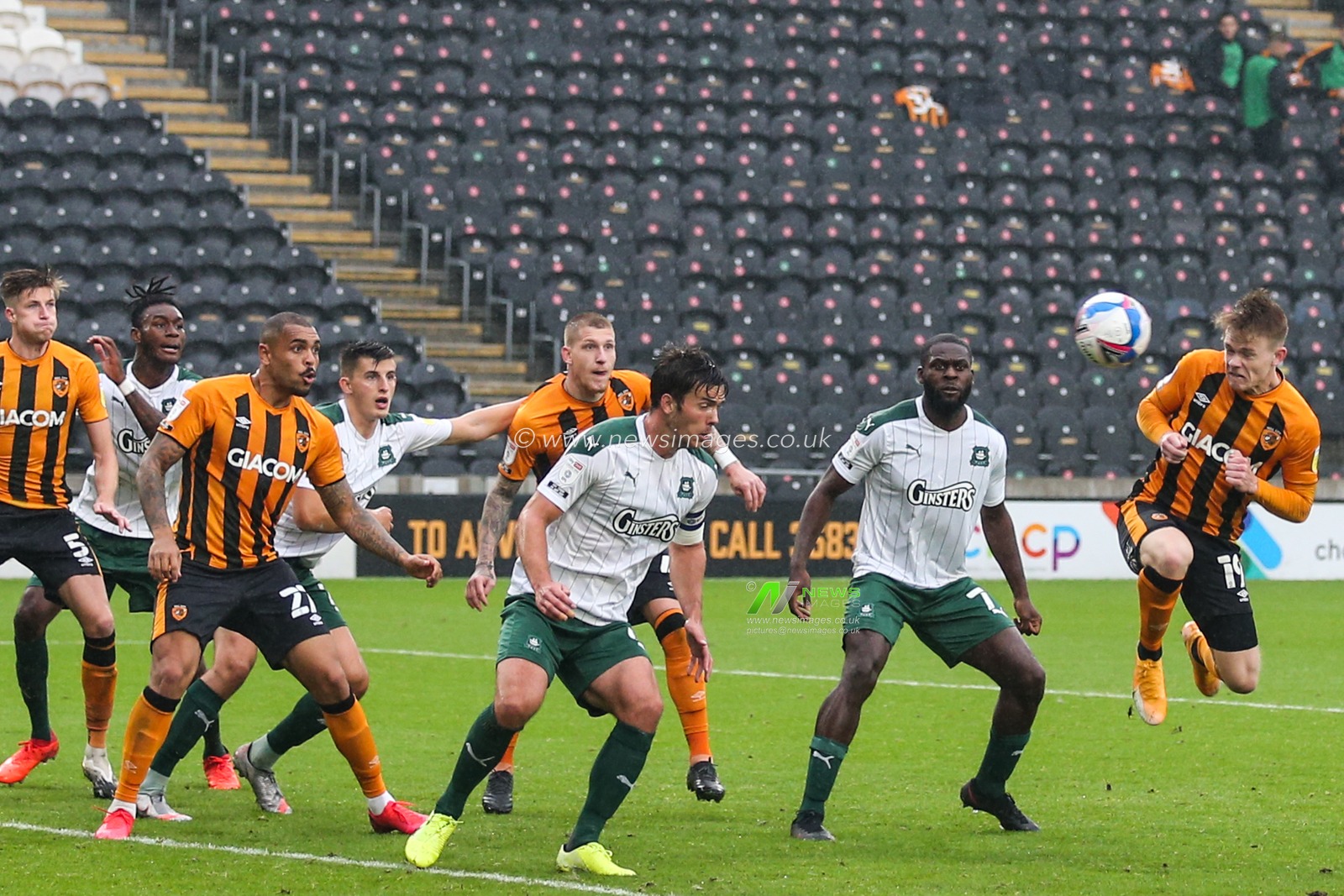 Keane Lewis-Potter (19) of Hull City gets up to head the ball towards the goal
