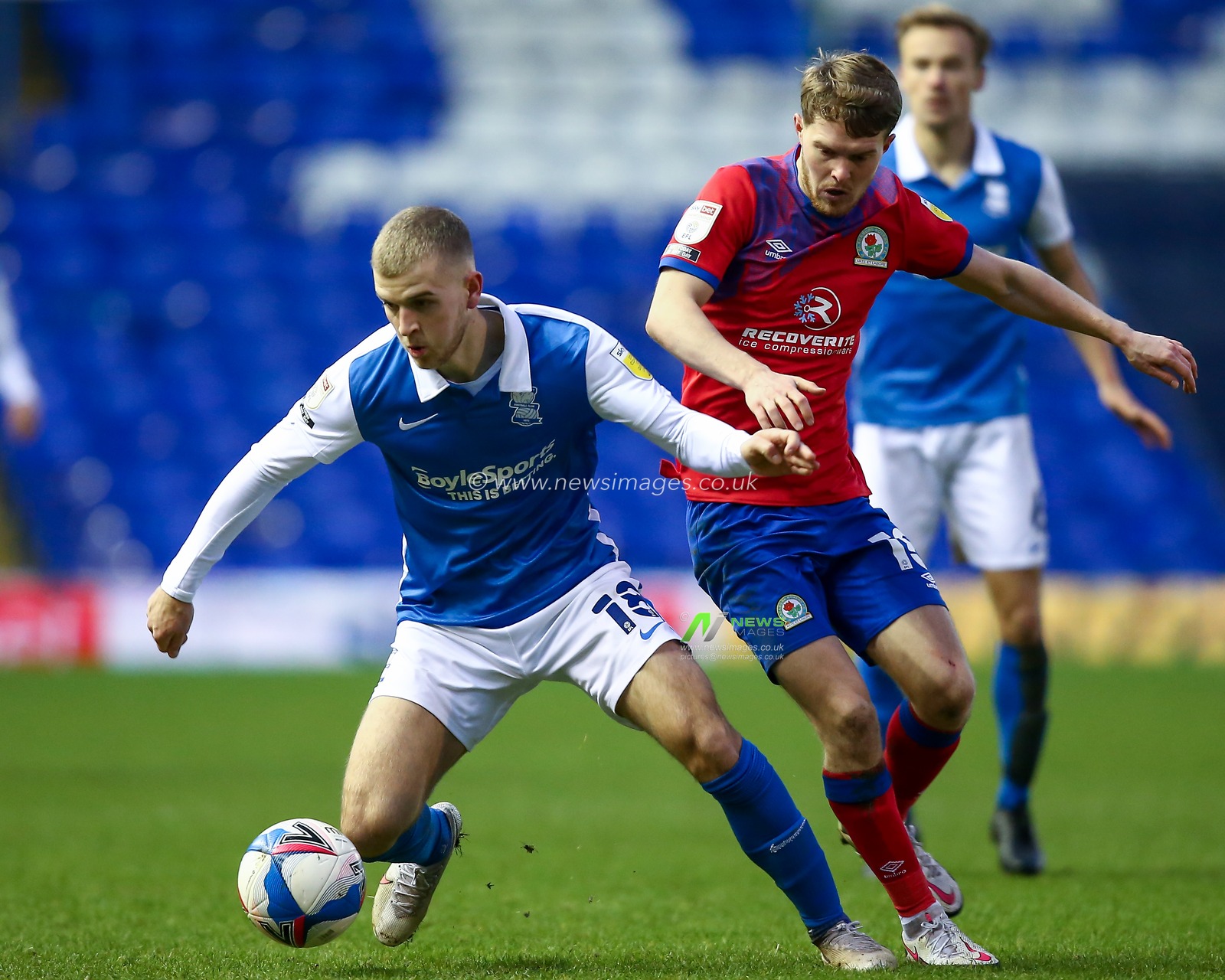 Riley McGree #18 of Birmingham City protects the ball