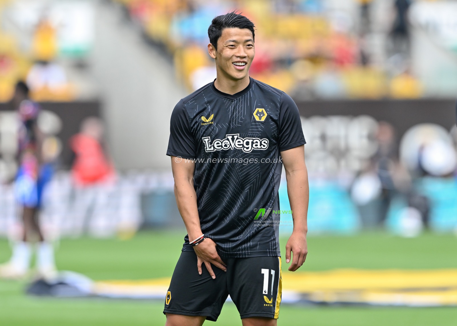 Hwang Hee-Chan of Wolverhampton Wanderers warms up ahead of the match, during the Premier League match Wolverhampton Wanderers vs Crystal Palace at Molineux, Wolverhampton, United Kingdom, 11th May 2024

(Photo by Cody Froggatt/News Images)
