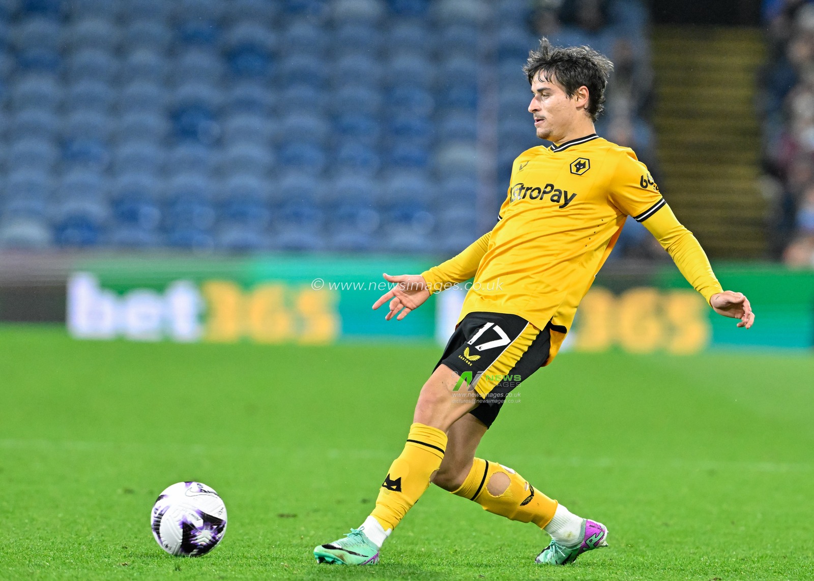 Hugo Bueno of Wolverhampton Wanderers passes the ball, during the Premier League match Burnley vs Wolverhampton Wanderers at Turf Moor, Burnley, United Kingdom, 2nd April 2024

(Photo by Cody Froggatt/News Images)