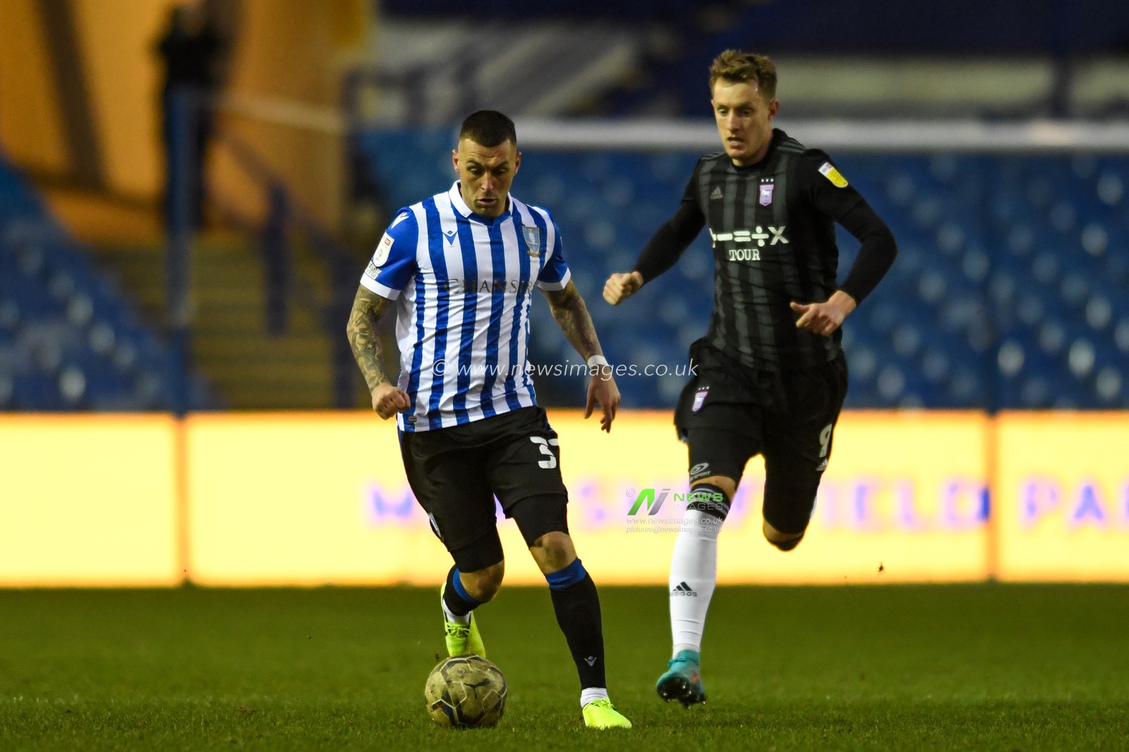 Jack Hunt #32 of Sheffield Wednesday starts an attacking move