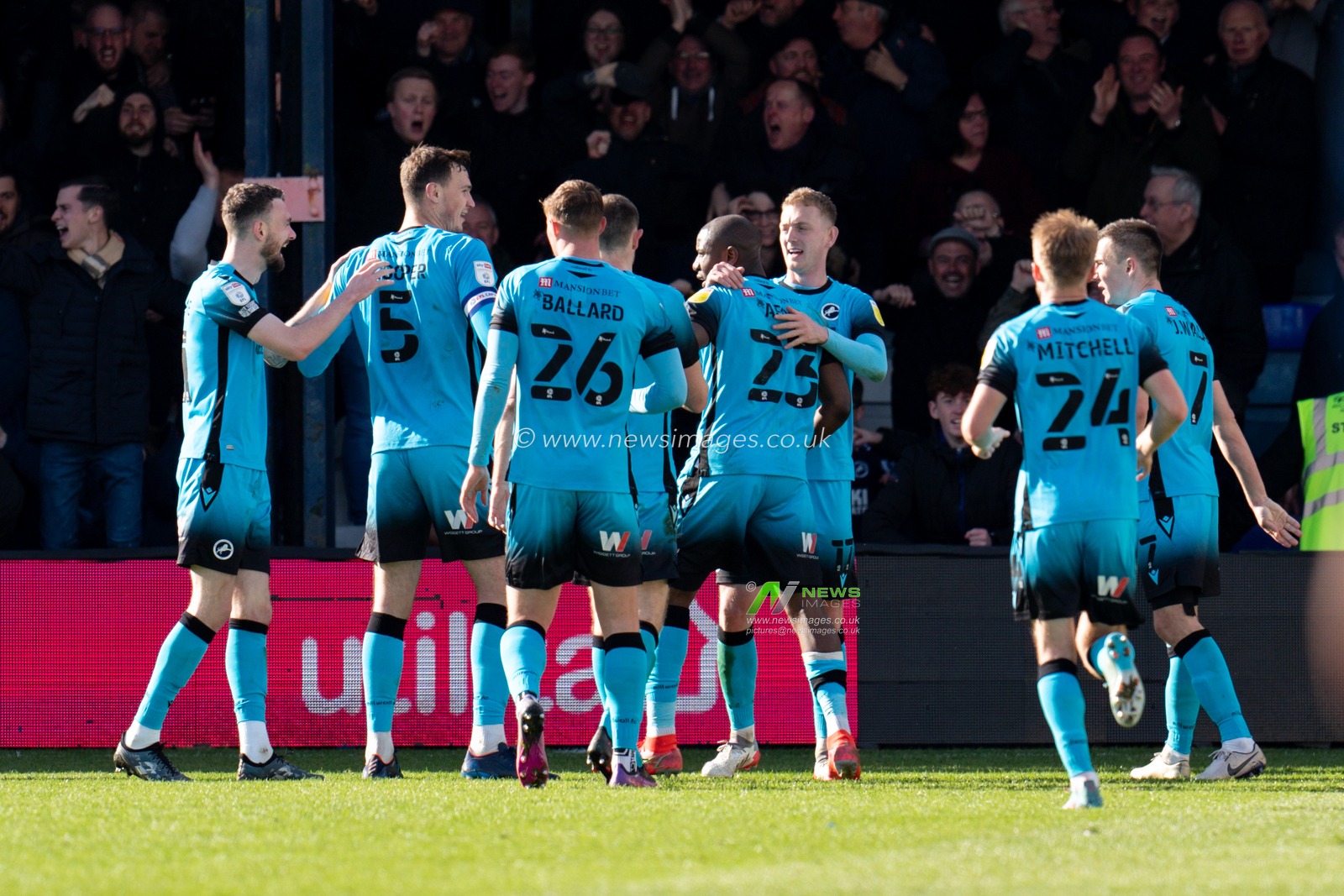 Benik Afobe #23 of Millwall celebrates scoring a goal with his team mates