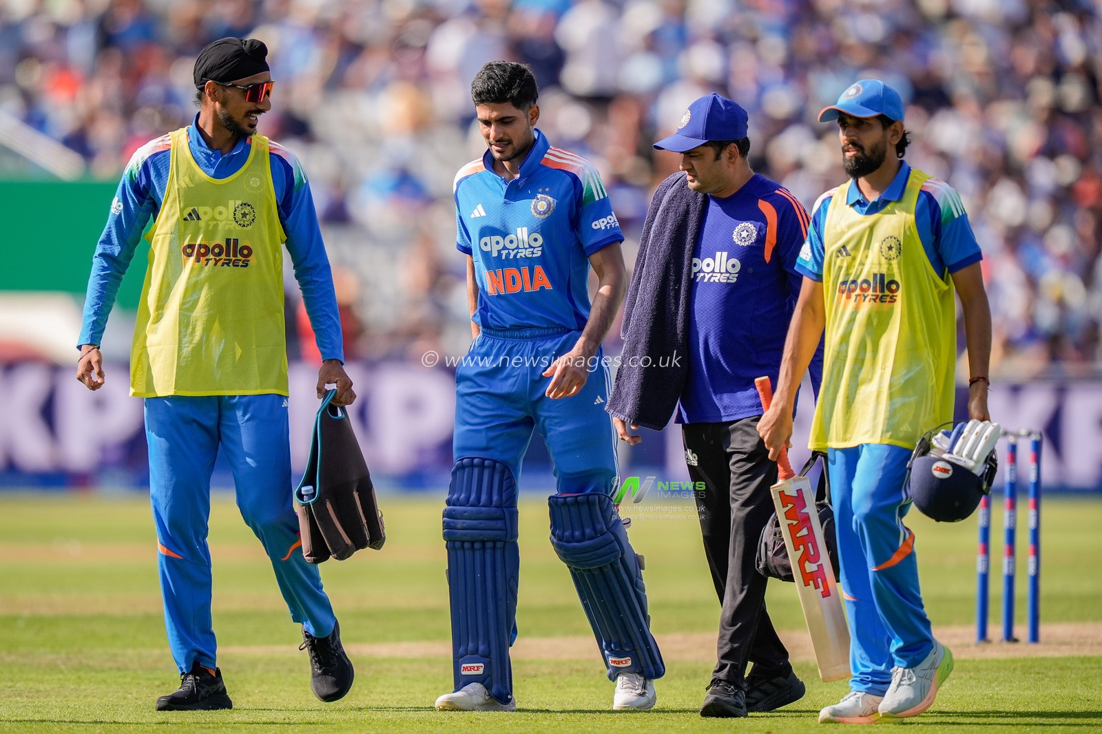 India captain Shubman Gill walks off the field escorted by team physio and teammates with a potential injury and retires hurt during the 1st Metro Bank ODI match England vs India at Edgbaston, Birmingham, United Kingdom on 14 July 2026

(Photo by Maynard Manyowa/News Images)