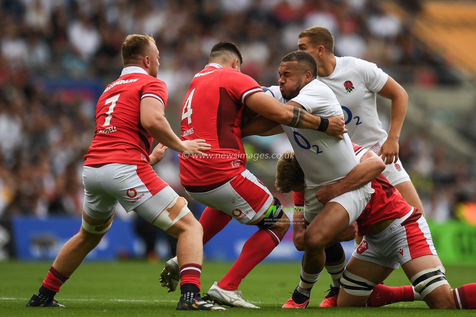 Ollie Lawrence of England is tackled by Rhys Davies of Wales during the 2023 Summer Series match England vs Wales at Twickenham Stadium, Twickenham, United Kingdom, 12th August 2023

(Photo by Mike Jones/News Images)