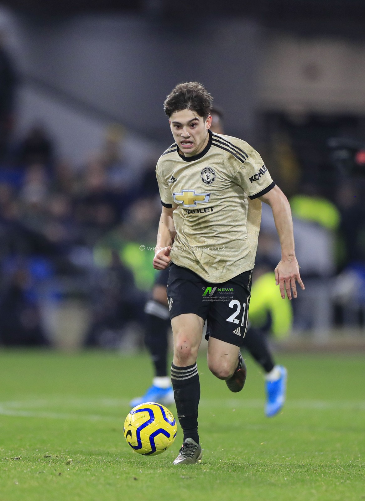 28th December 2019, Turf Moor, Burnley, England; Premier League, Burnley v Manchester United : Daniel James (21) of Manchester United runs with the ball

Credit: Conor Molloy/News Images