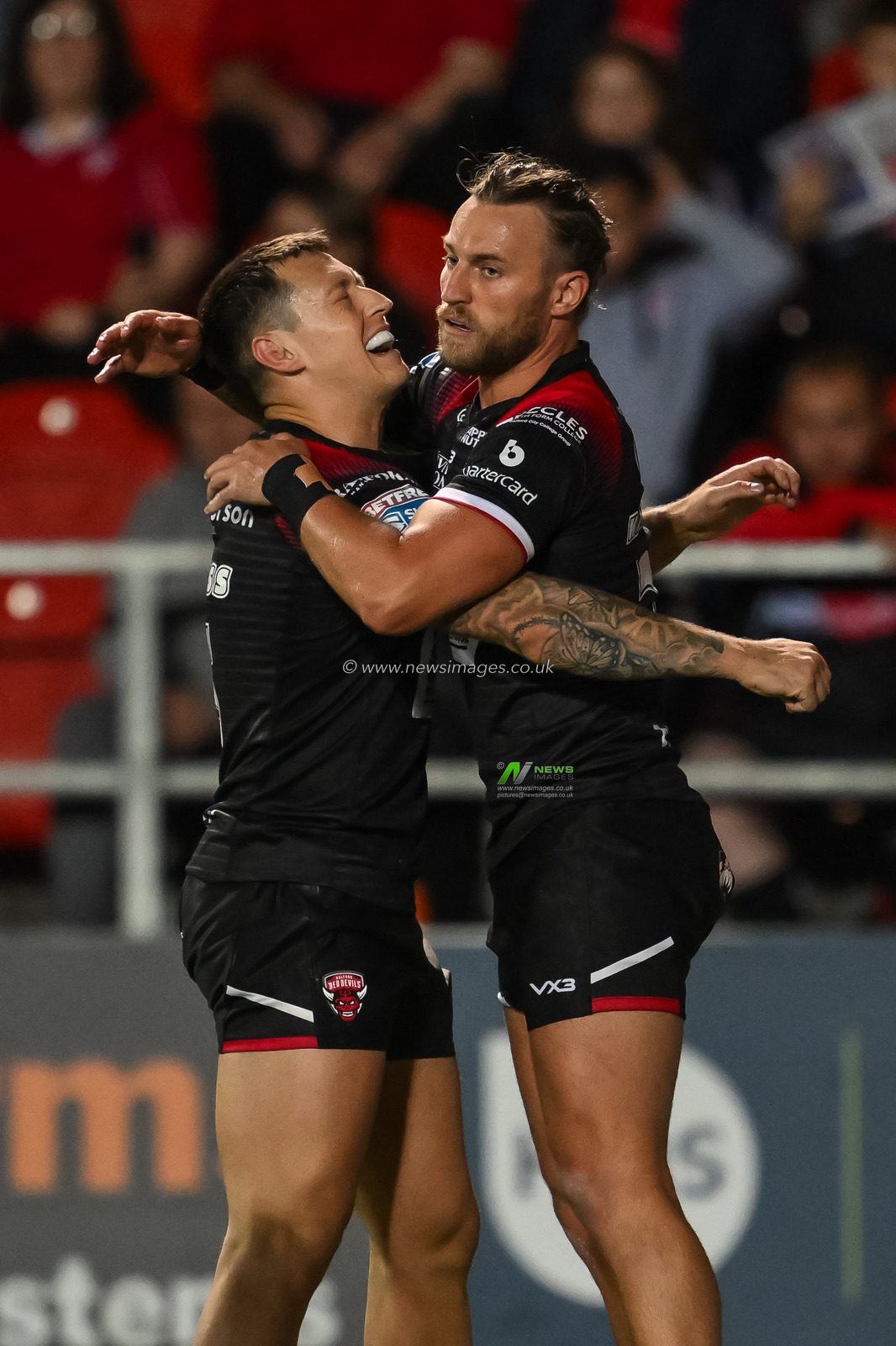 Chris Hankinson of Salford Red Devils celebrates his try during the Betfred Super League Round 21 match St Helens vs Salford Red Devils at Totally Wicked Stadium, St Helens, United Kingdom, 8th August 2024

(Photo by Craig Thomas/News Images)