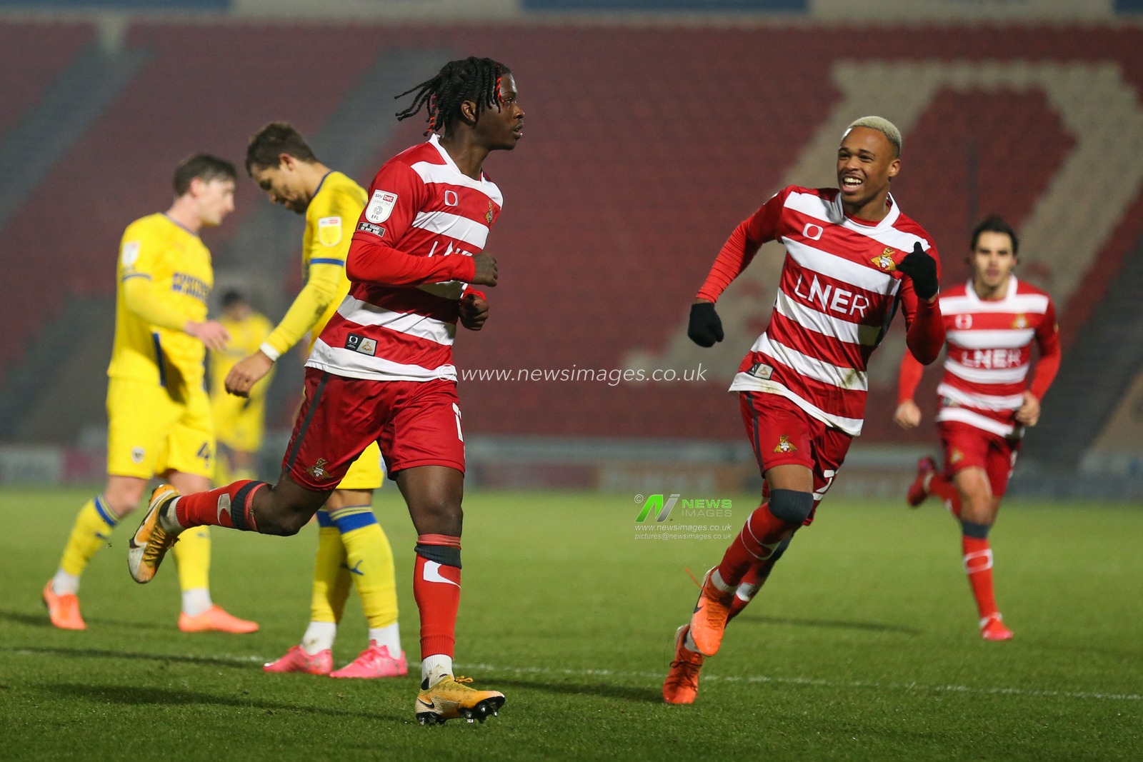 CELEBRATION Taylor Richards #17 of Doncaster Rovers celebrates his goal to make it 2-0