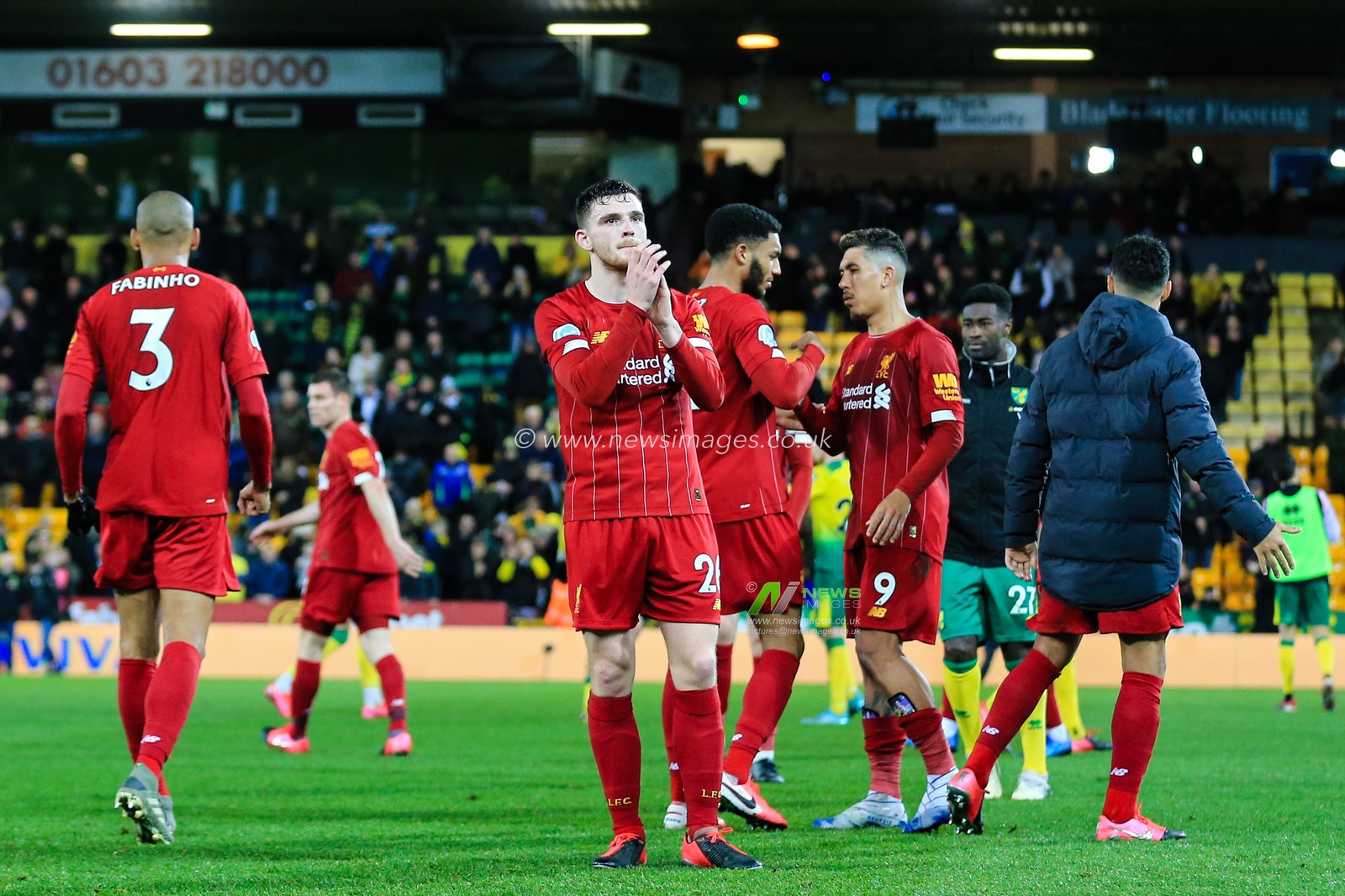 15th February 2020, Carrow Road, Norwich, England; Premier League, Norwich City v Liverpool : Andrew Robertson (26) of Liverpool applauds their fans following the final whistle