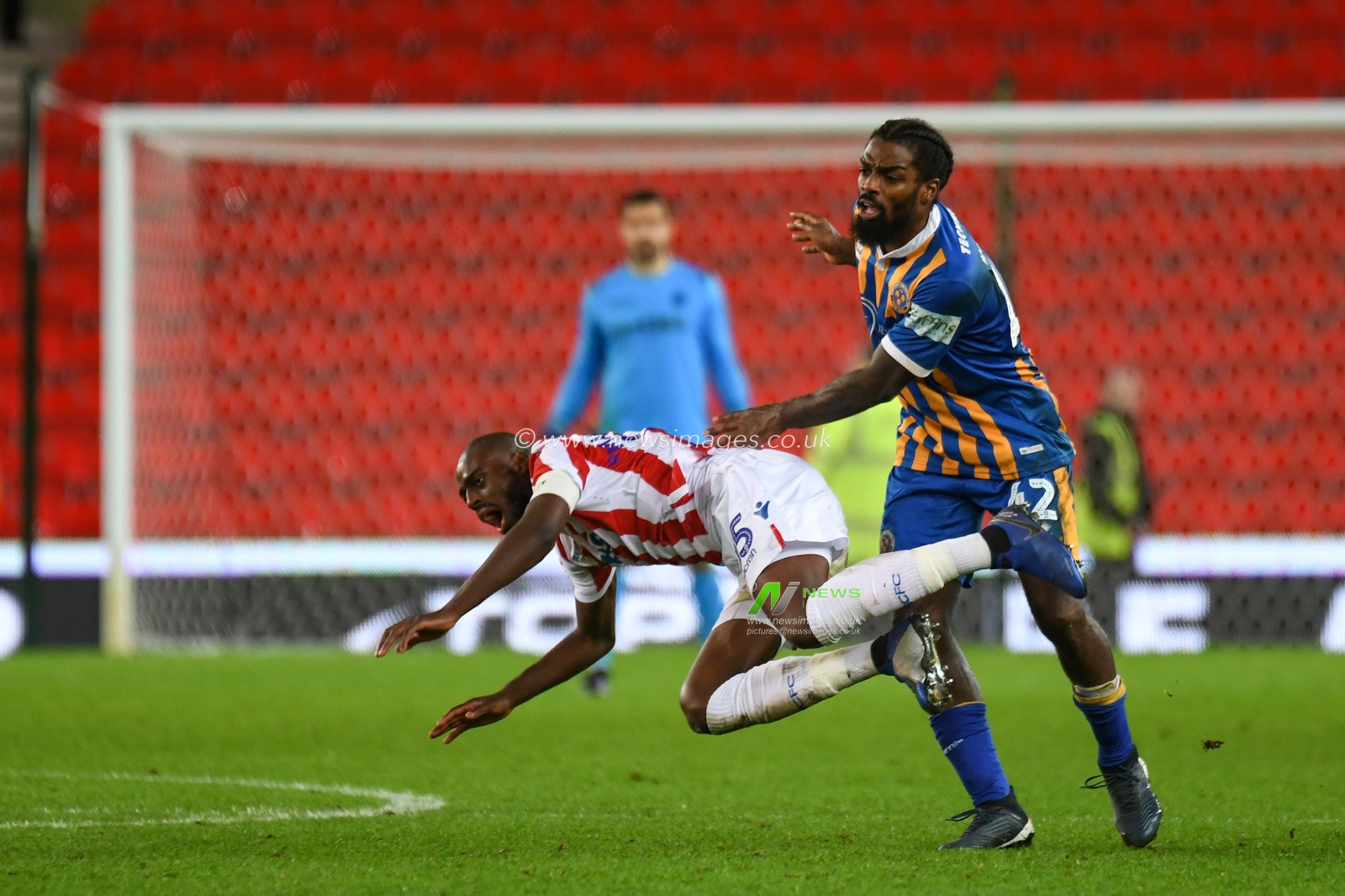 15th January 2019, Bet 365 Stadium, Stoke-on-Trent, England; Emirates FA Cup, 3rd Round replay, Stoke City vs Shrewsbury Town ; Bruno Martins Indi (15) of Stoke City is brought down by Anthony Grant (42) of Shrewsbury Town 


Credit: Richard Long/News Images

English Football League images are subject to DataCo Licence