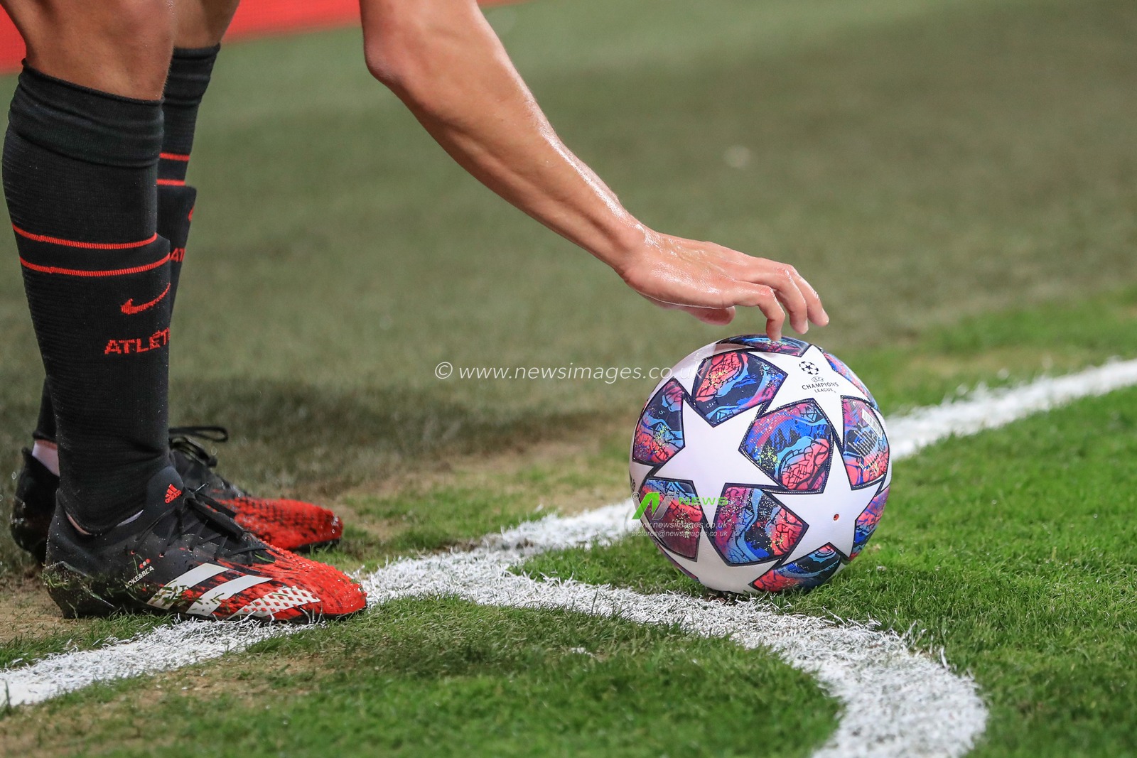 11th March 2020, Anfield, Liverpool, England; UEFA Champions League, Round of 16 Leg 2 of 2, Liverpool v Atletico Madrid : SaÃºl (8) of Atletico Madrid places the Adidas match ball to take a corner