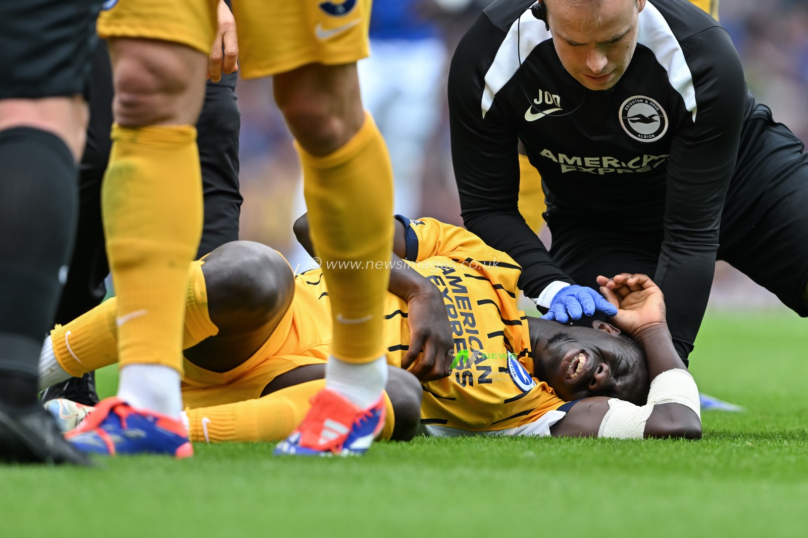 Yankuba Minteh of Brighton & Hove Albion goes down with an injury during the Premier League match Everton vs Brighton and Hove Albion at Goodison Park, Liverpool, United Kingdom, 17th August 2024

(Photo by Cody Froggatt/News Images)