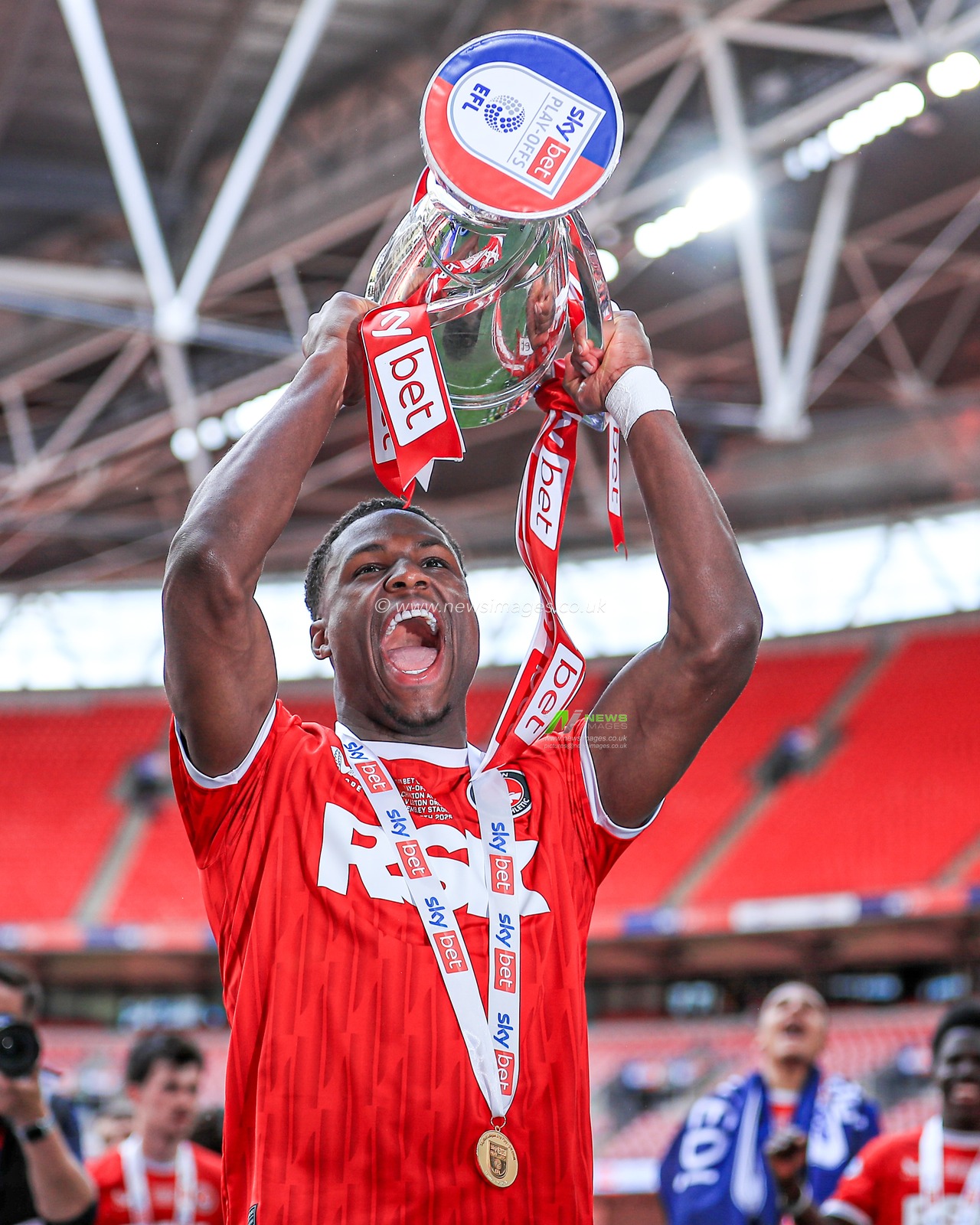 Kayne Ramsay of Charlton Athletic celebrate getting promotion back to the Sky Bet Championship after the Sky Bet League 1 Playoff Final match Charlton Athletic vs Leyton Orient at Wembley Stadium, London, United Kingdom, 25th May 2025

(Photo by Jorge Horsted/News Images)