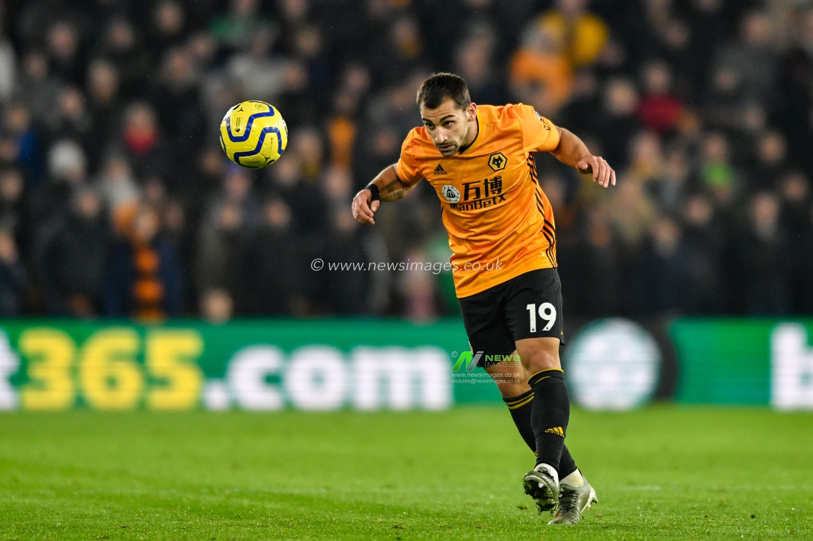 4th December 2019, Molineux, Wolverhampton, England; Premier League, Wolverhampton Wanderers v West Ham United : Jonny (19) of Wolverhampton Wanderers heads the ball 

Credit: Simon Whitehead/News Images