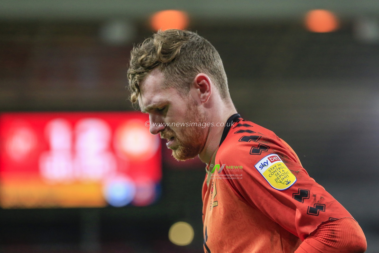 Andy Fisher #13 of Milton Keynes Dons in action with the scoreboard showing Sunderland 1 Milton Keynes Dons 2