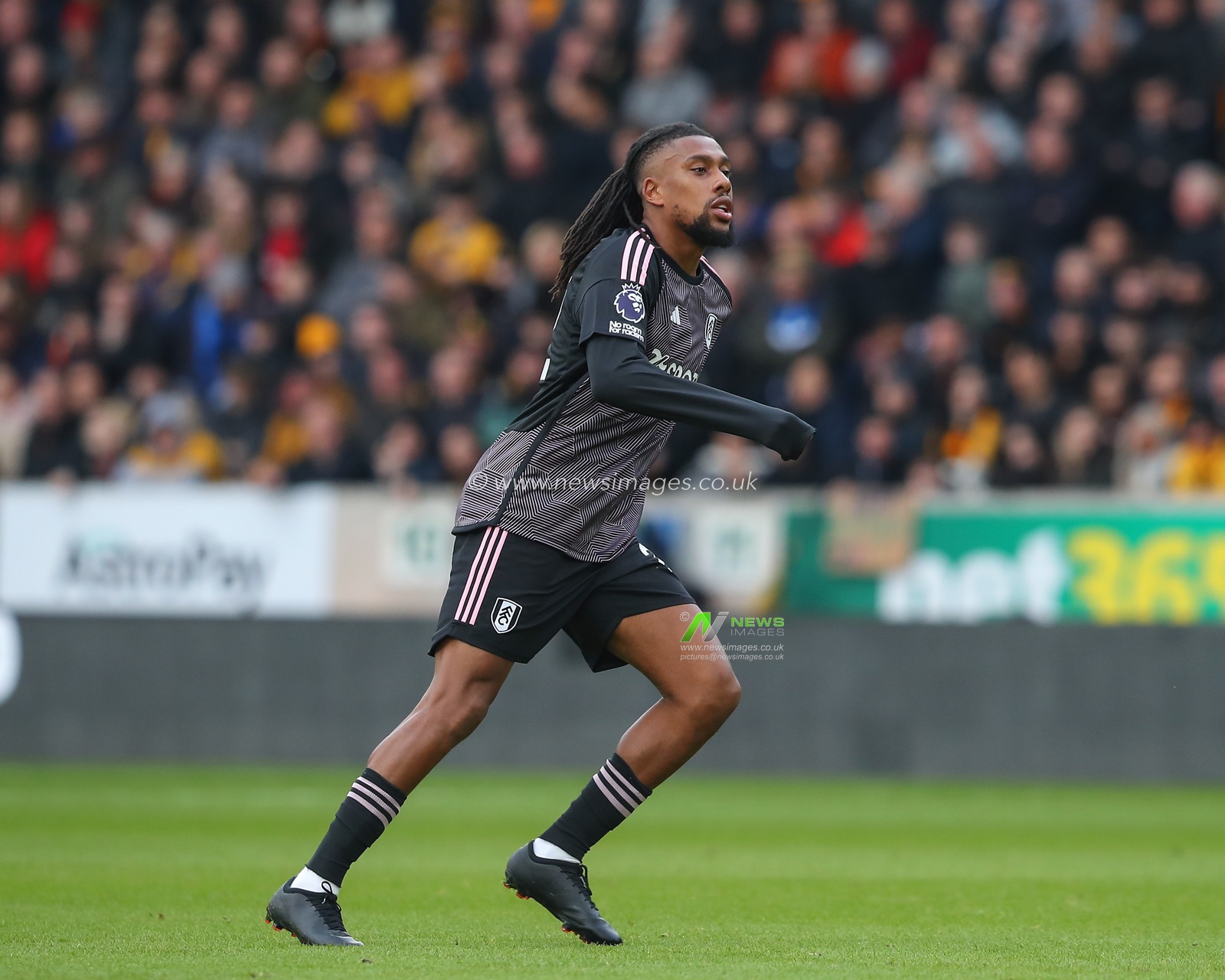 Alex Iwobi of Fulham, during the Premier League match Wolverhampton Wanderers vs Fulham at Molineux, Wolverhampton, United Kingdom, 9th March 2024

(Photo by Gareth Evans/News Images)