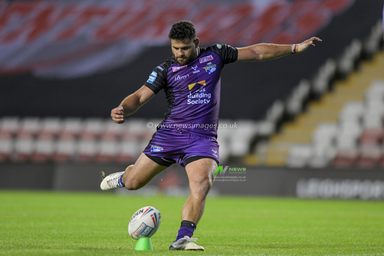 Rhyse Martin (12) of Leeds Rhinos successfully kicks a conversion to make it 6-22